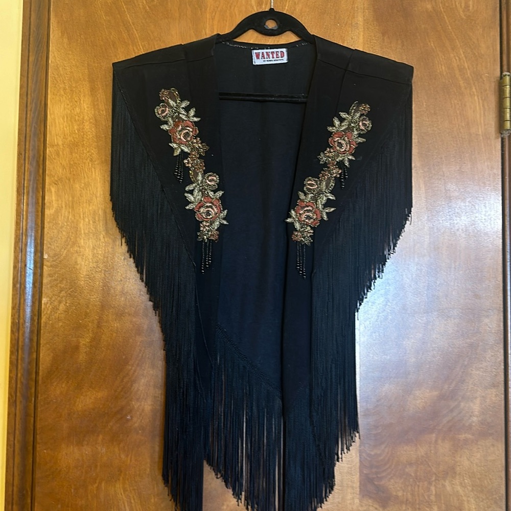 Unique Black Vest — open design without arm holes.